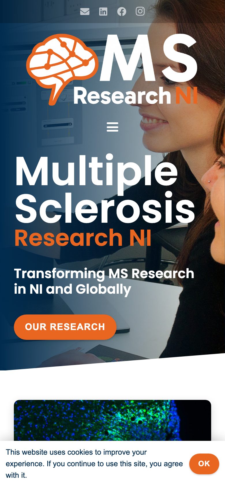 Multiple Sclerosis Research NI (QUB) website on mobile, designed by Web Design Belfast